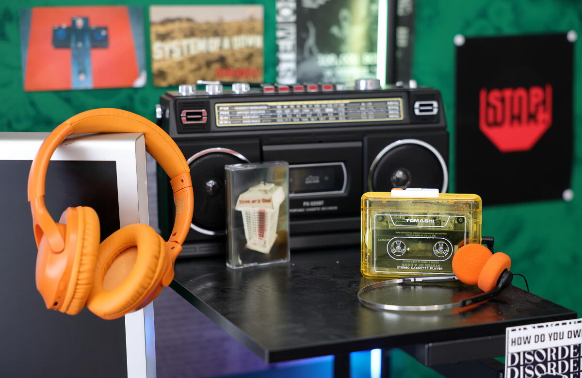 Headphones and boom box with band cassettes