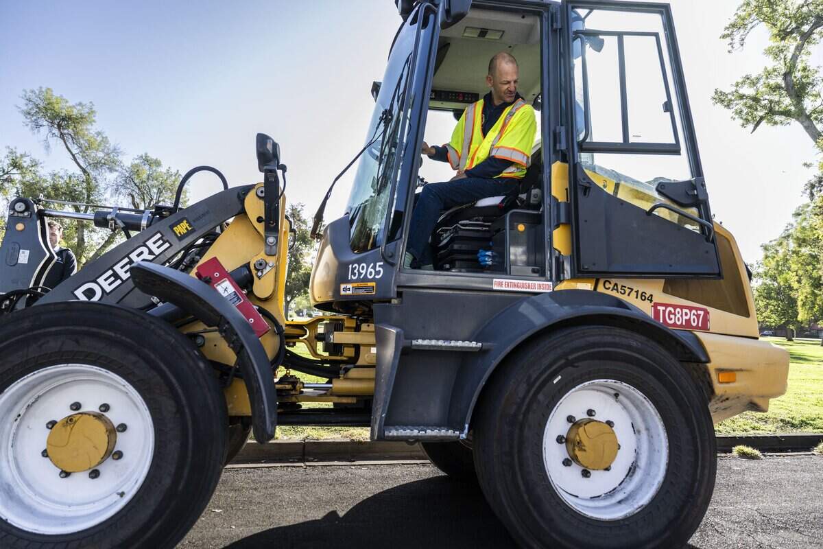 Sacramento Mayor Kevin McCarty sits in the Claw as he attends a winter weather preparation event in Land Park on Monday.