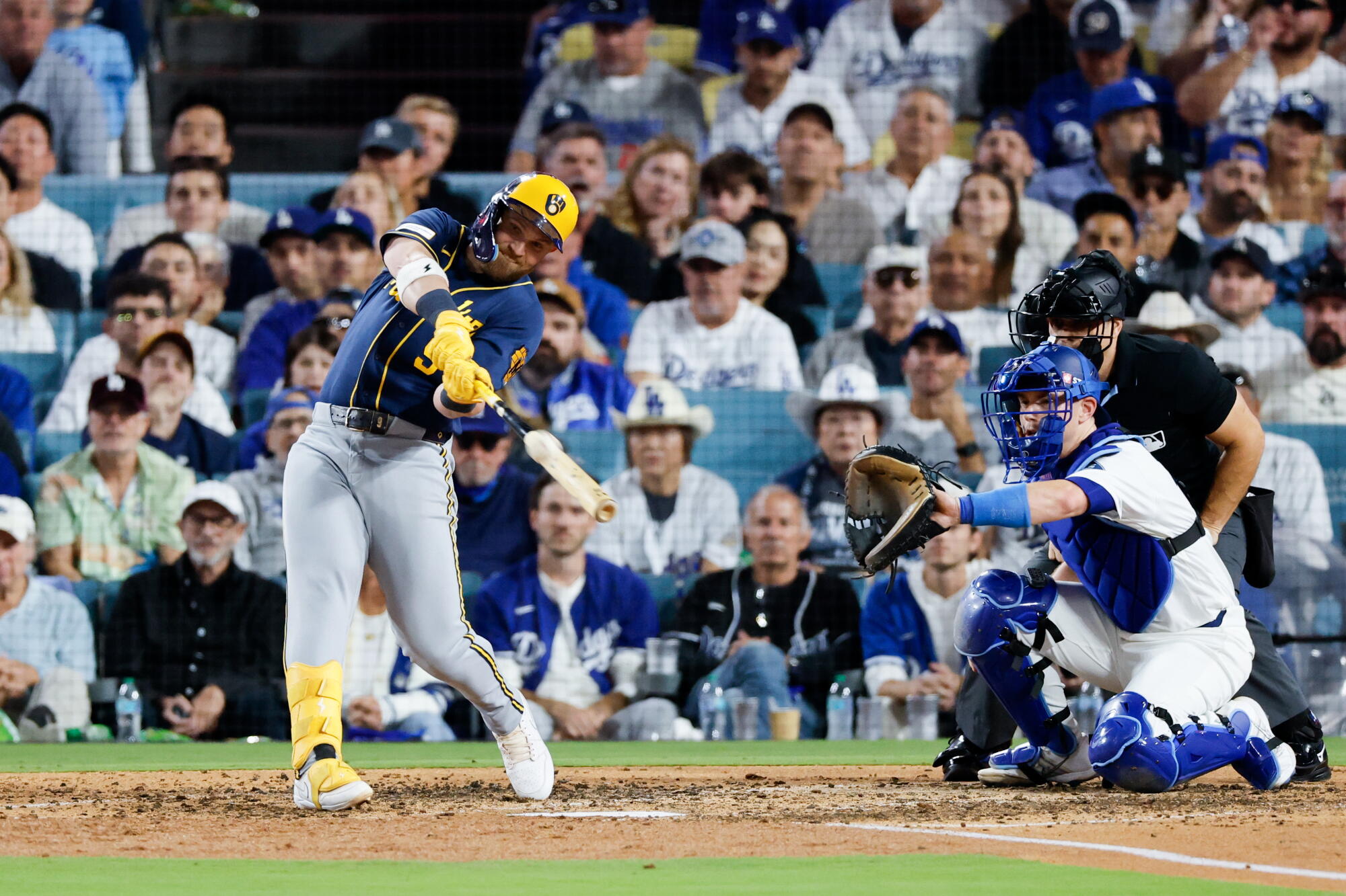 Brewers first baseman Jake Bauers hits a two-run home run during the seventh inning of Game 3 of the NLCS.