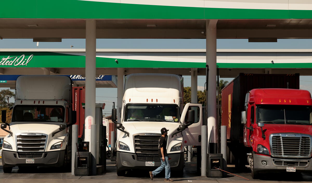 Truck drivers fill they diesel tanks at United Oil in Long Beach on Wednesday, Oct. 7, 2026.