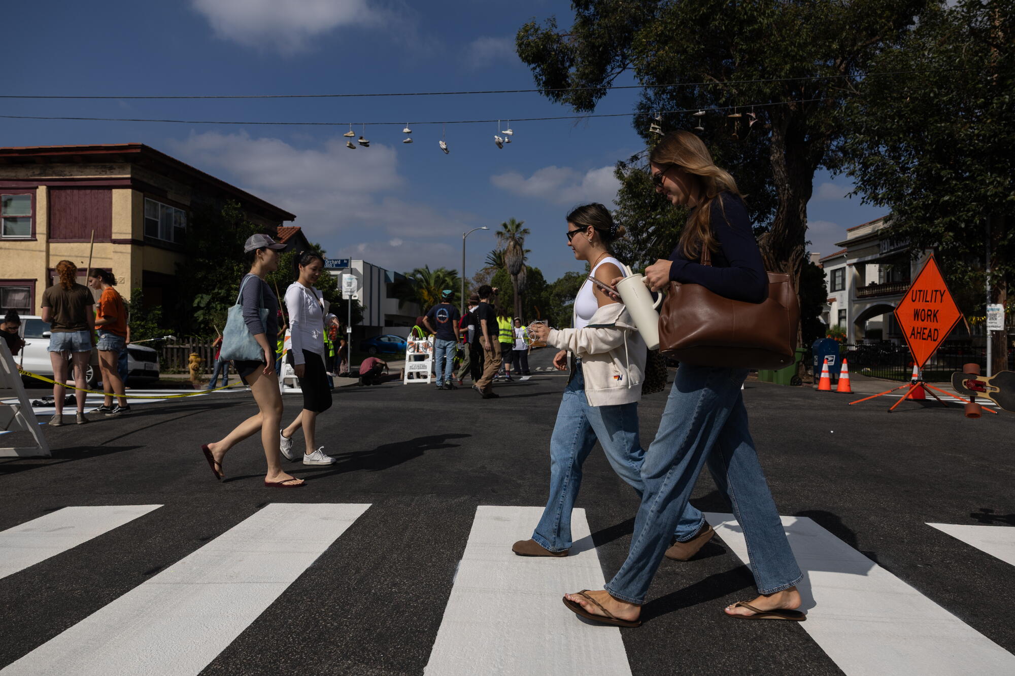 Pedestrians walk on one of the four fresh crosswalks near USC.