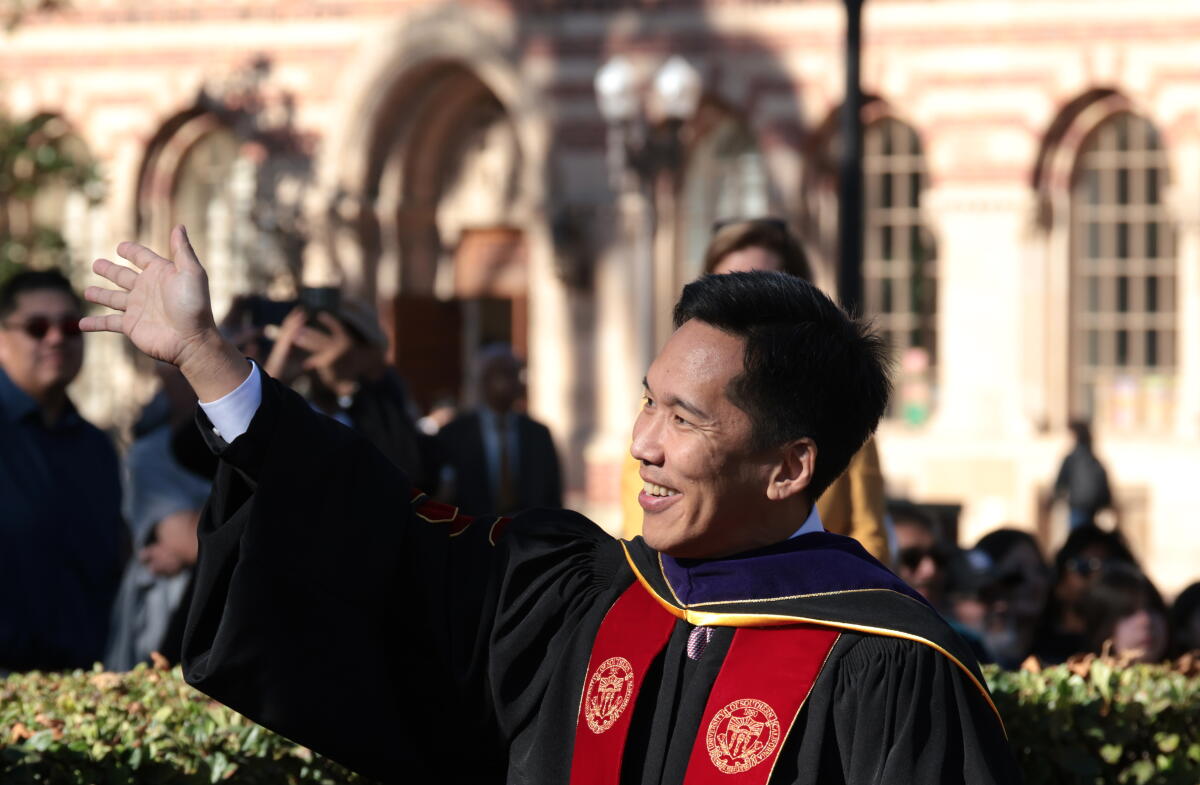 Beong-Soo Kim smiles at his investiture ceremony.