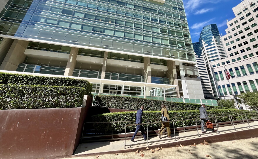 Attorney Wismick Saint-Jean walks into the United States Courthouse in downtown San Diego alongside his paralegal and Haitian Bridge Alliance co-founder Wister Gaetan, Oct, 16. 2026.