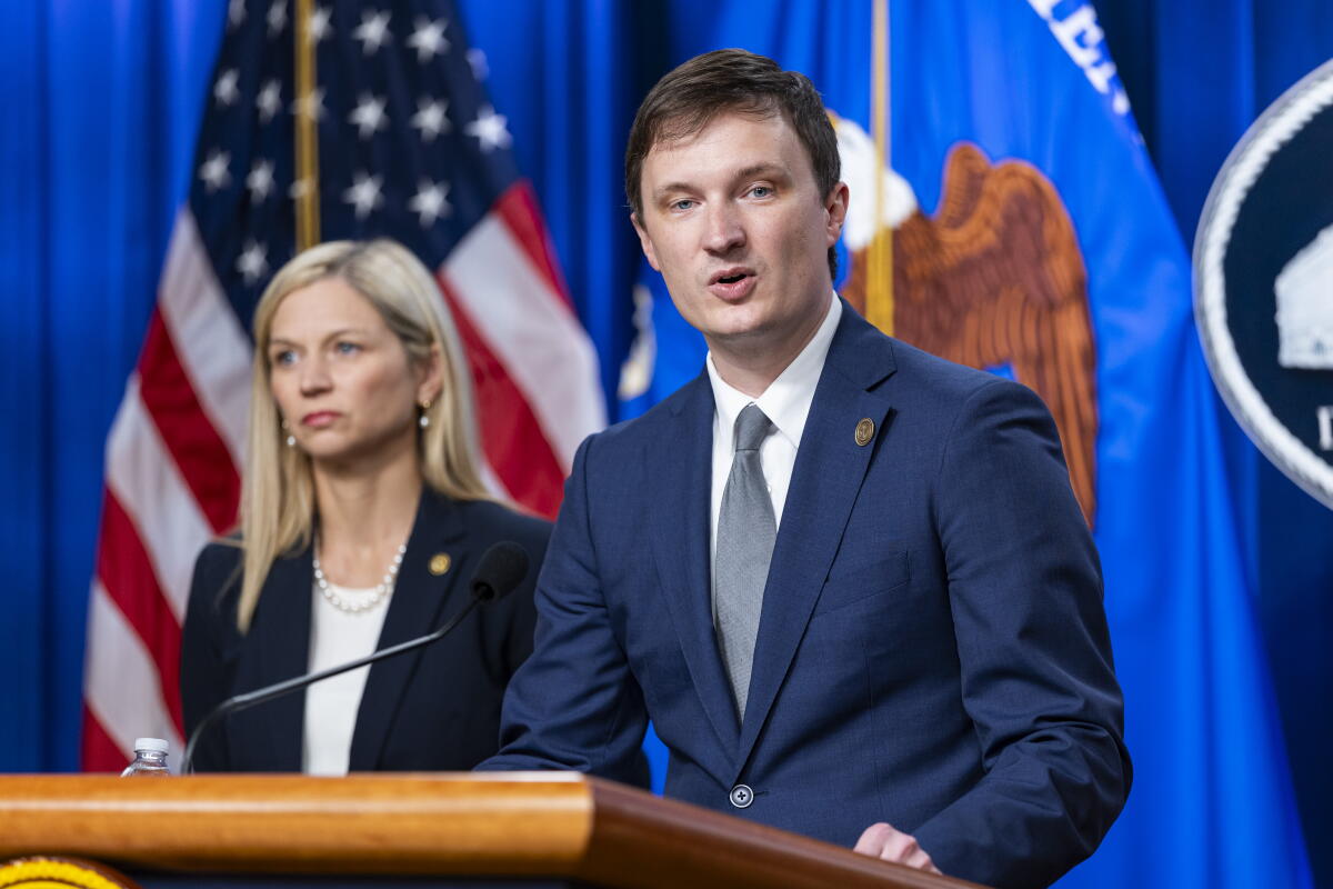 Acting Deputy Atty. Gen. Trent McCotter speaks at a news conference alongside U.S. Attorney for Utah Melissa Holyoak. 