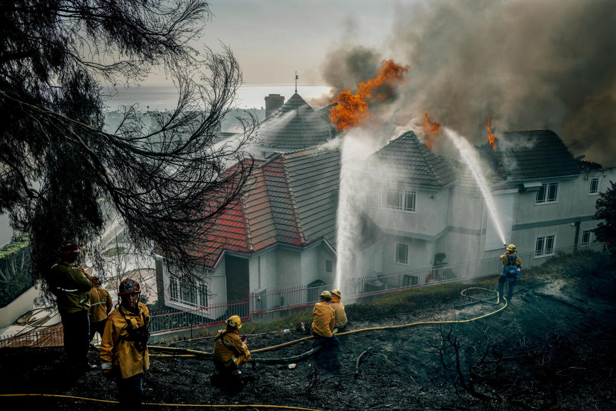 A house fire off Calle Miramar in San Juan Capistrano during the Norte Fire