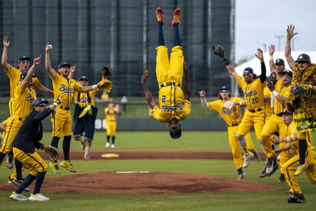 Dakota "Stilts" Albritton #14 of the Savannah Bananas pitches against the Party Animals at Grayson Stadium on May 11, 2023 in Savannah, Georgia. Albritton plays Banana Ball on Stilts. He plays the field, bats, and he pitches all while wearing a pair of stilts while playing. The Historic Grayson Stadium is the home of the independent professional baseball team called the Savannah Bananas. The Bananas were part of the Coastal Plain League, a summer collegiate league, for seven seasons. In 2022, the Bananas announced that they were leaving the Coastal Plain League to play Banana Ball year-round. Banana Ball was born out of the idea of making baseball more fast-paced, entertaining, and fun. (Photo by Al Bello/Getty Images)