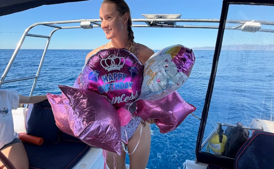 Catherine Breed has been swimming along the California coast since July. Somewhere off the Los Angeles and Orange County coasts, she finds Mylar balloons.