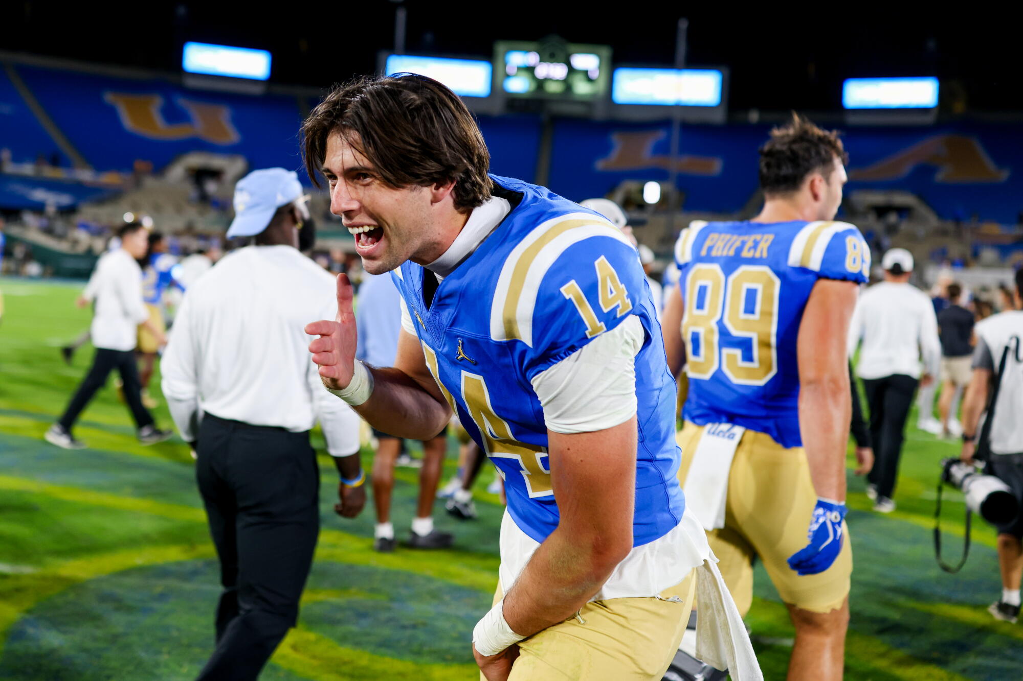 UCLA quarterback Ty Dieffenbach reacts after the Bruins' win over Wisconsin at the Rose Bowl on Saturday.