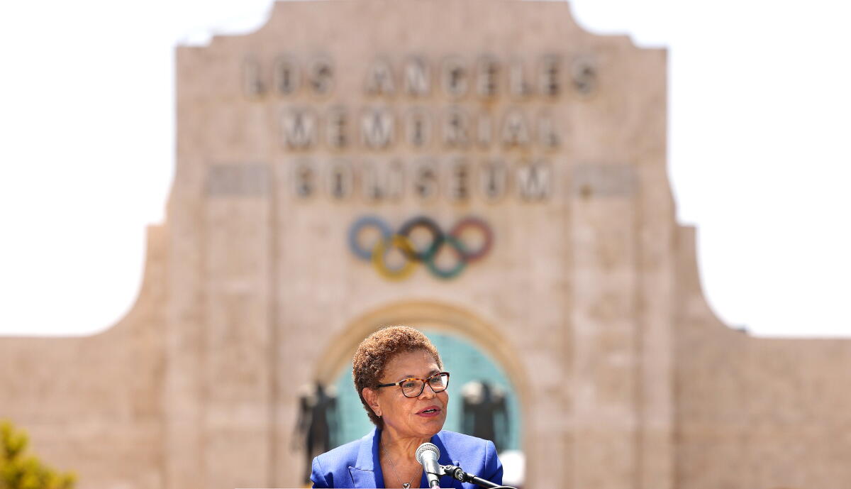 Mayor Karen Bass speaks in front of the Los Angeles Memorial Coliseum