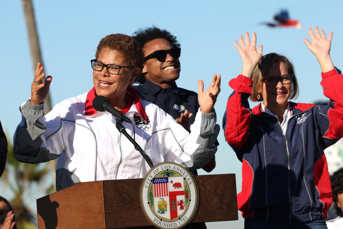 Mayor Karen Bass, left, pro skater and Play LA coach Coco Atama and Councilmember Traci Park.