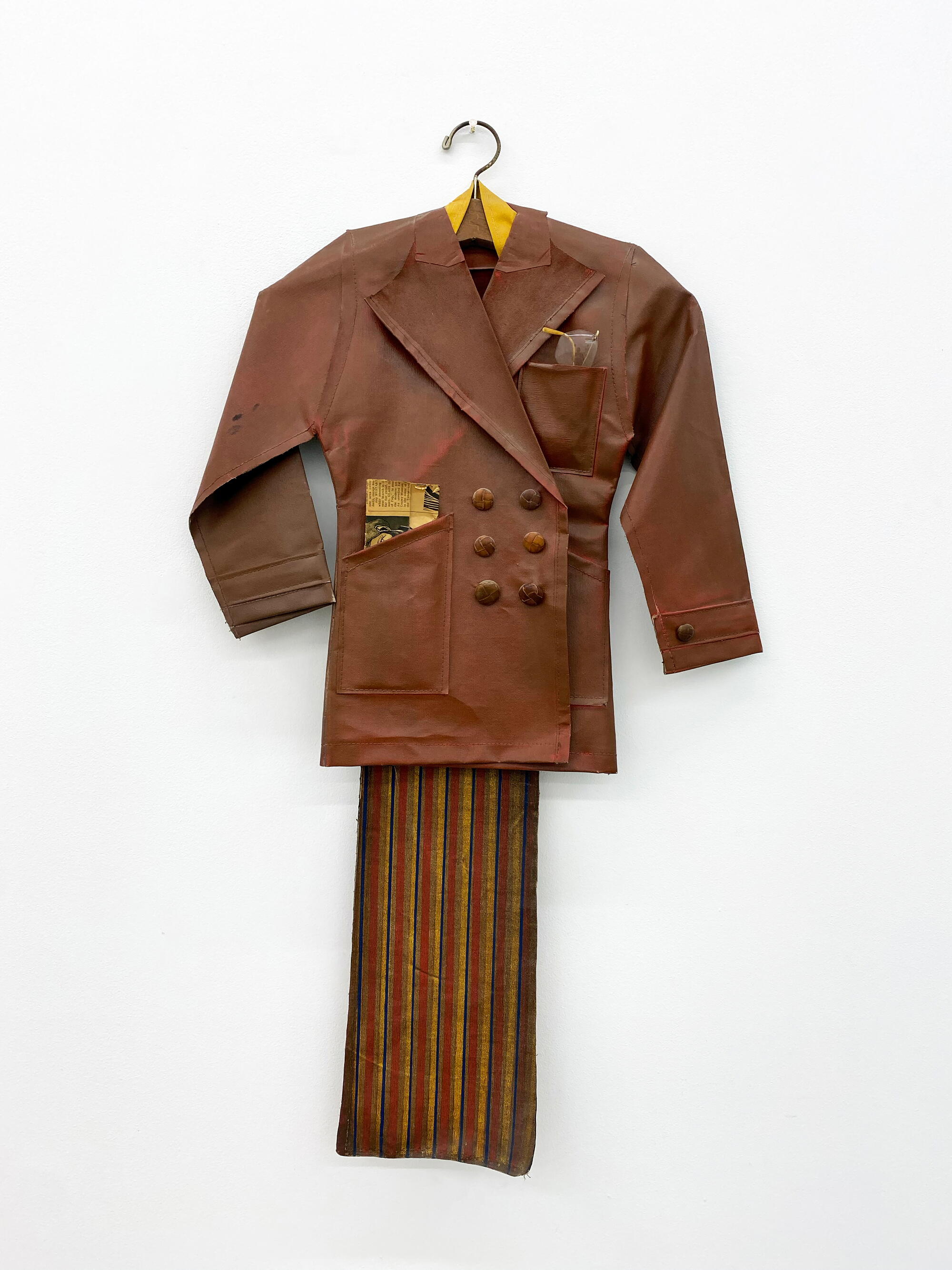 A piece of art resembling a suit.