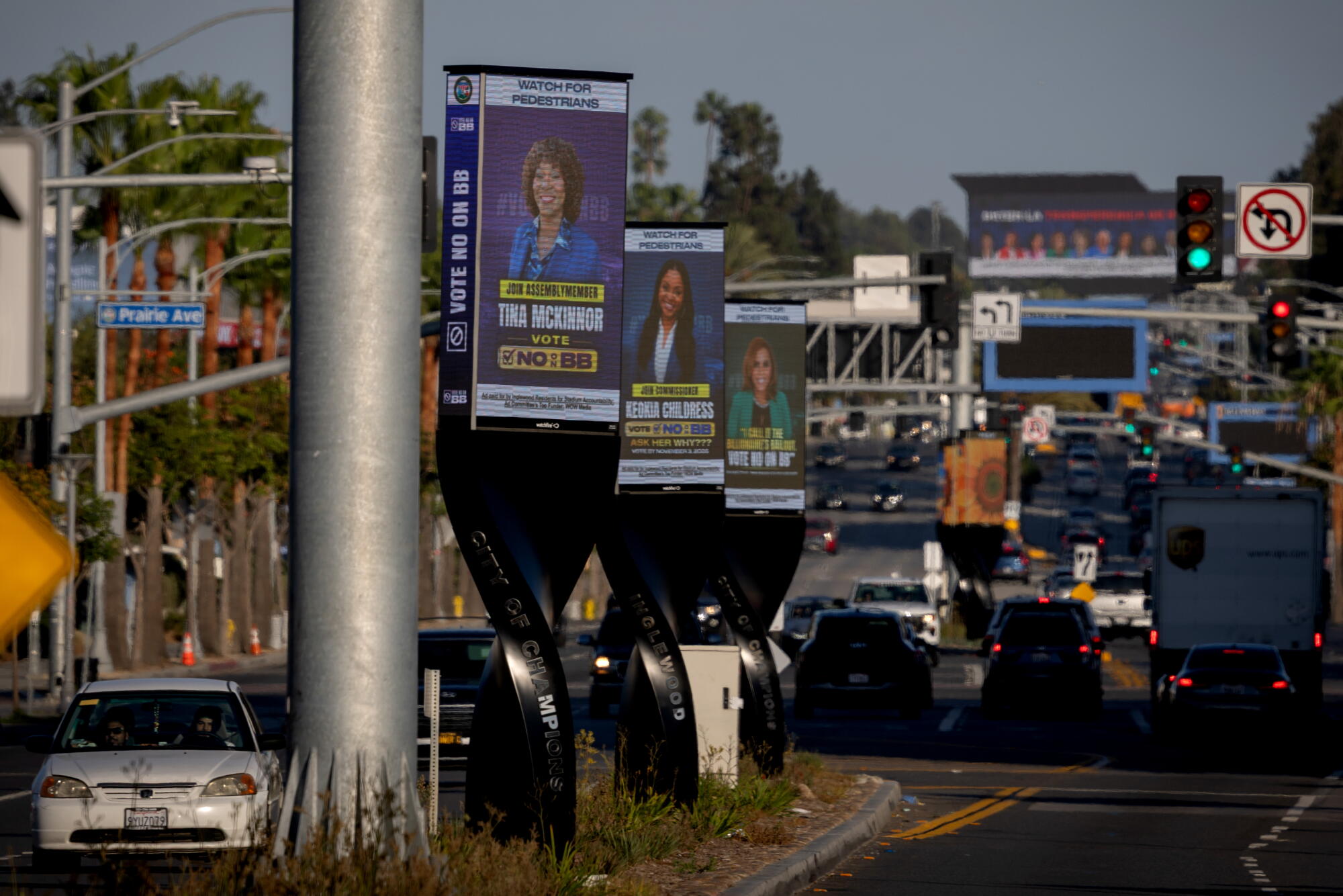 Electronic billboards are seen on along Century Boulevard in Inglewood.