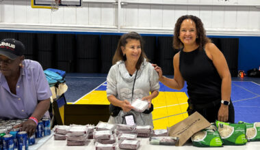 Paola Puig, center, and Silvana DeBellis, right, are some of the 16 Long Beach campus members from CenterPoint who volunteer at Long Beach&rsquo;s MLK Community Center.