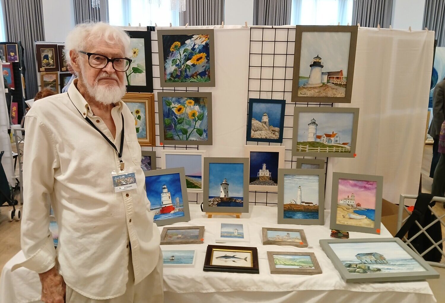Ninety-one-year-old Bob Bozek, of Oceanside, has sold more than 200 paintings in his long career. He was one of more than 20 artists whose work was on display.