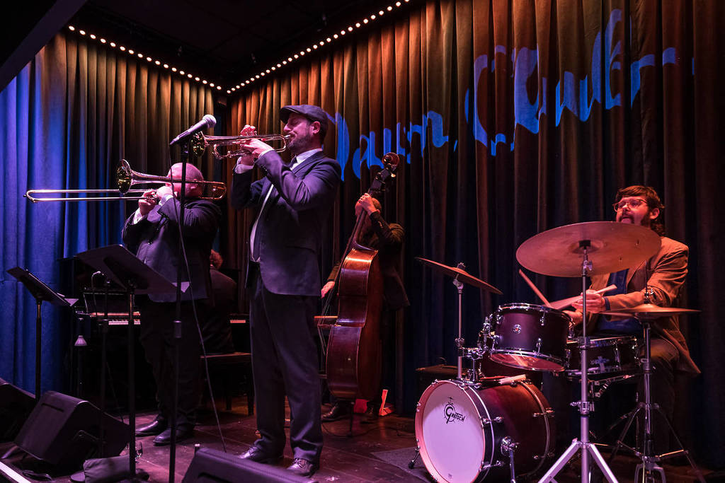 a club with jazz musicians playin