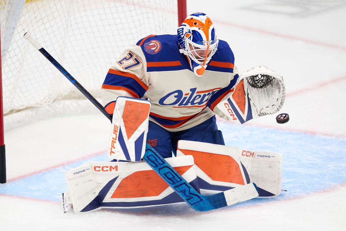 The Edmonton Oilers goalie Devon Levi #27 blocks a shot during an NHL game against The Anaheim Ducks on October 7th, 2026 Honda Center in Anaheim, California.
