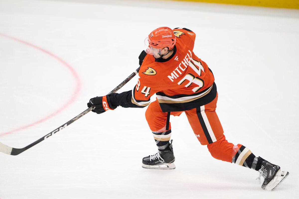The Anaheim Ducks defender Travis Mitchell #34 shoots a goal attempt during an NHL game against The Edmonton Oilers on October 7th, 2026 Honda Center in Anaheim, California.