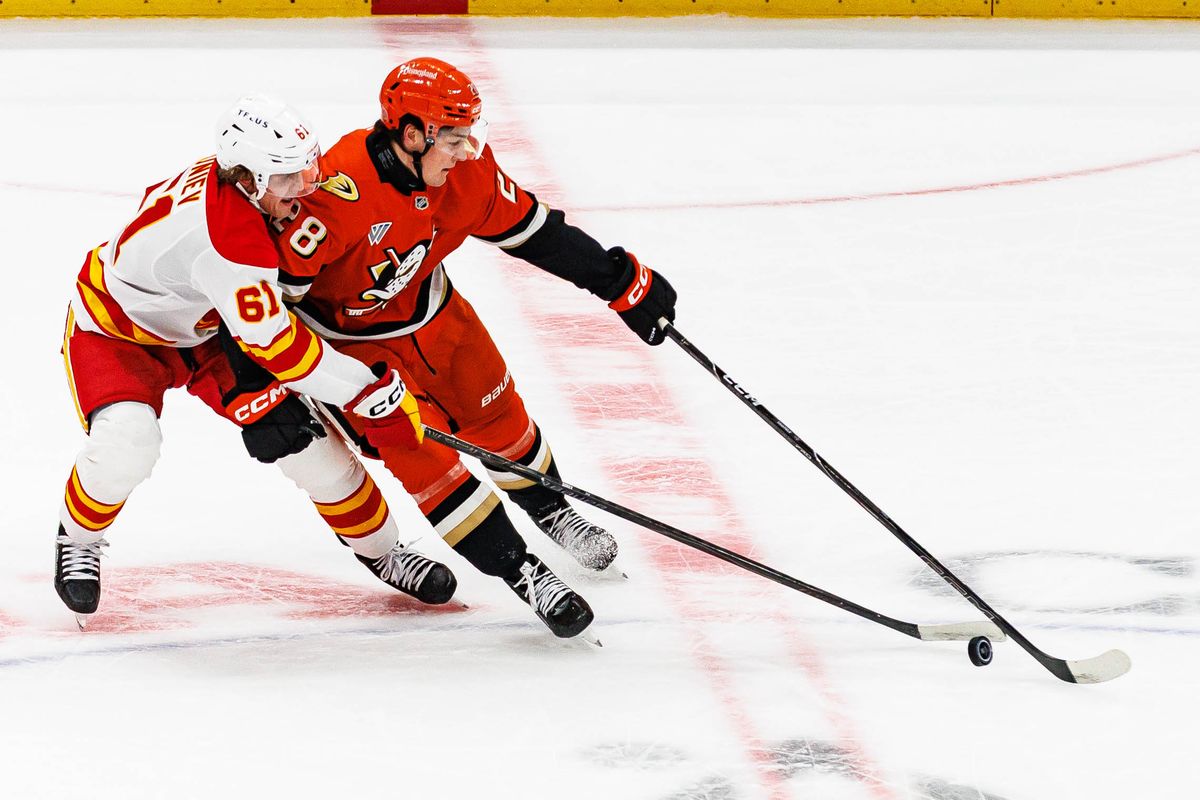 Judd Caulfield #28 of the Anaheim Ducks defends the puck during an NHL game against the Calgary Flames on October 13, 2026 at Honda Center in Anaheim, California.
