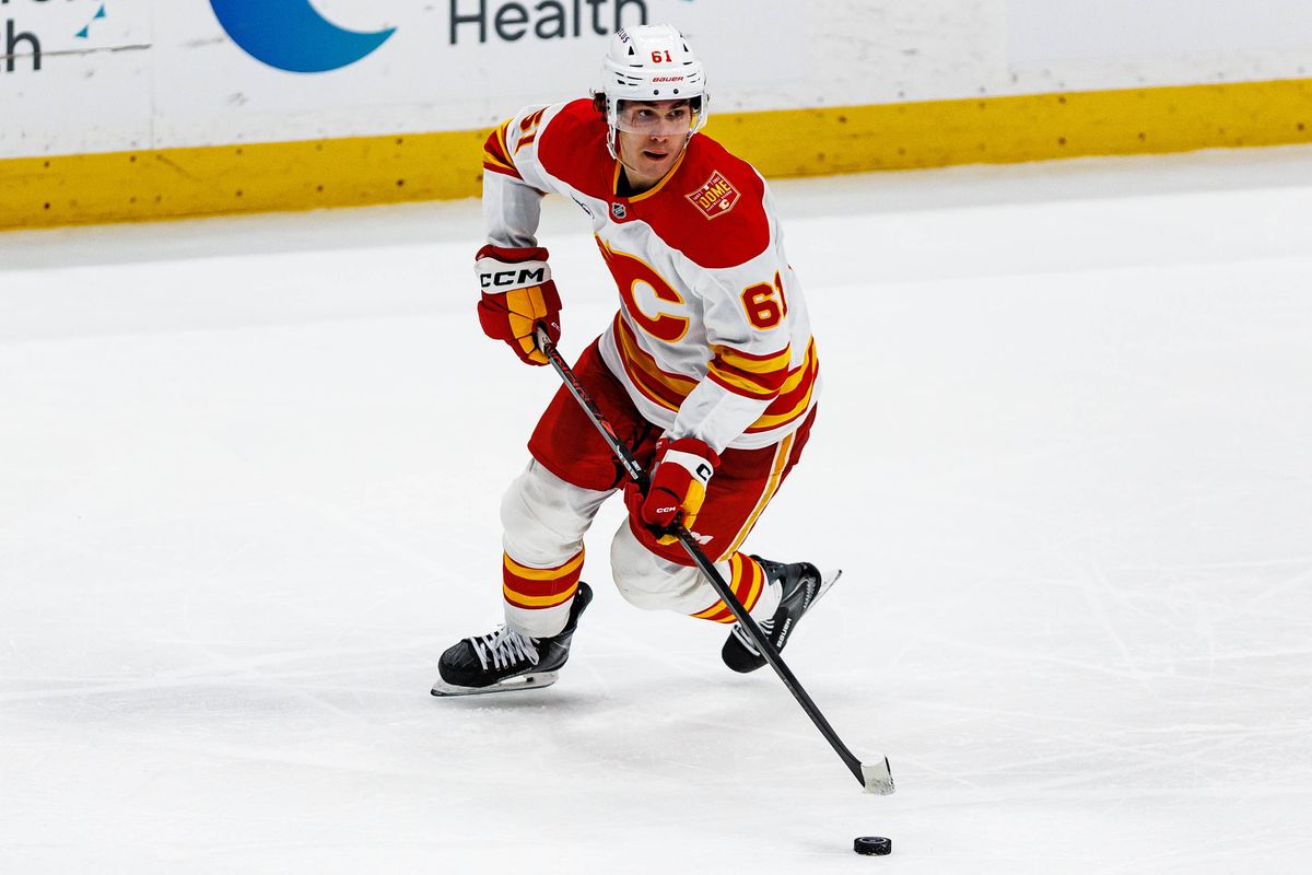 Aydar Suniev #61 of the Calgary Flames skates with the puck during an NHL game against the Anaheim Ducks on October 13, 2026 at Honda Center in Anaheim, California.
