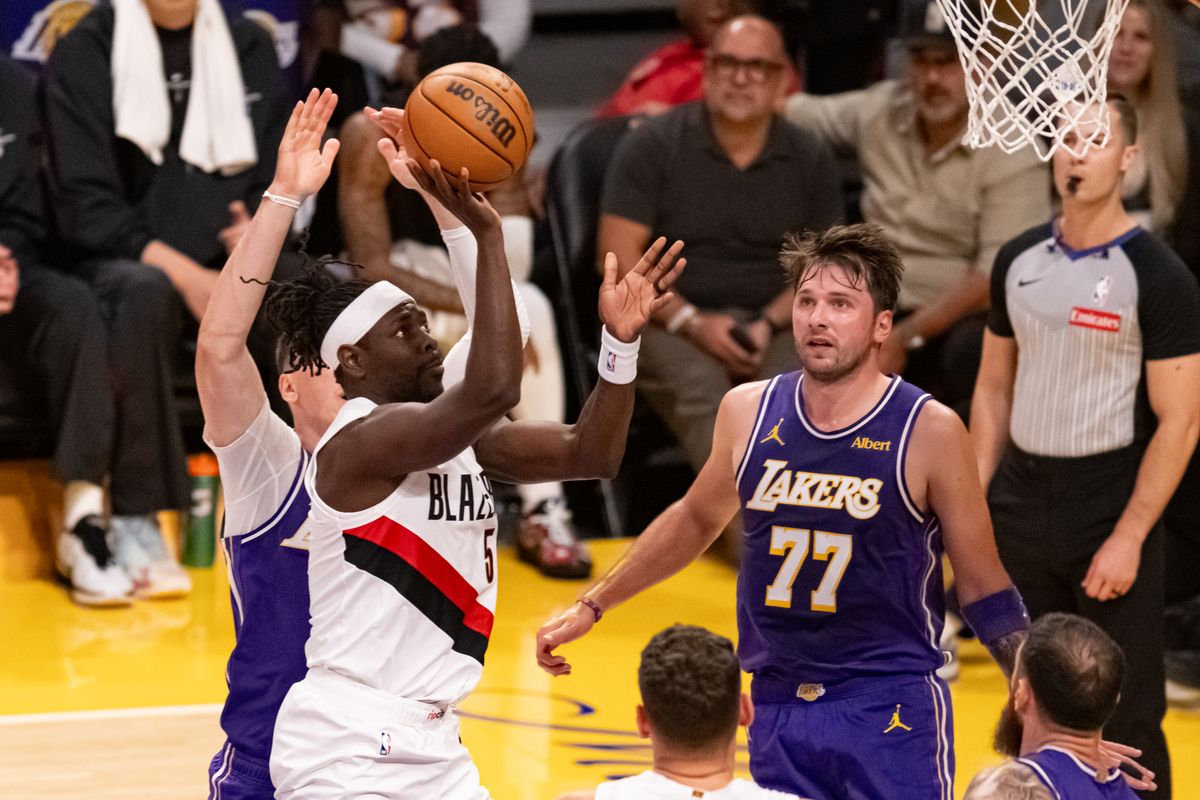 Portland Trailblazers guard Jrue Holiday (5) drives for a floater during an NBA basketball game against Los Angeles Lakers, Tuesday, October 27, 2026 in Los Angeles.