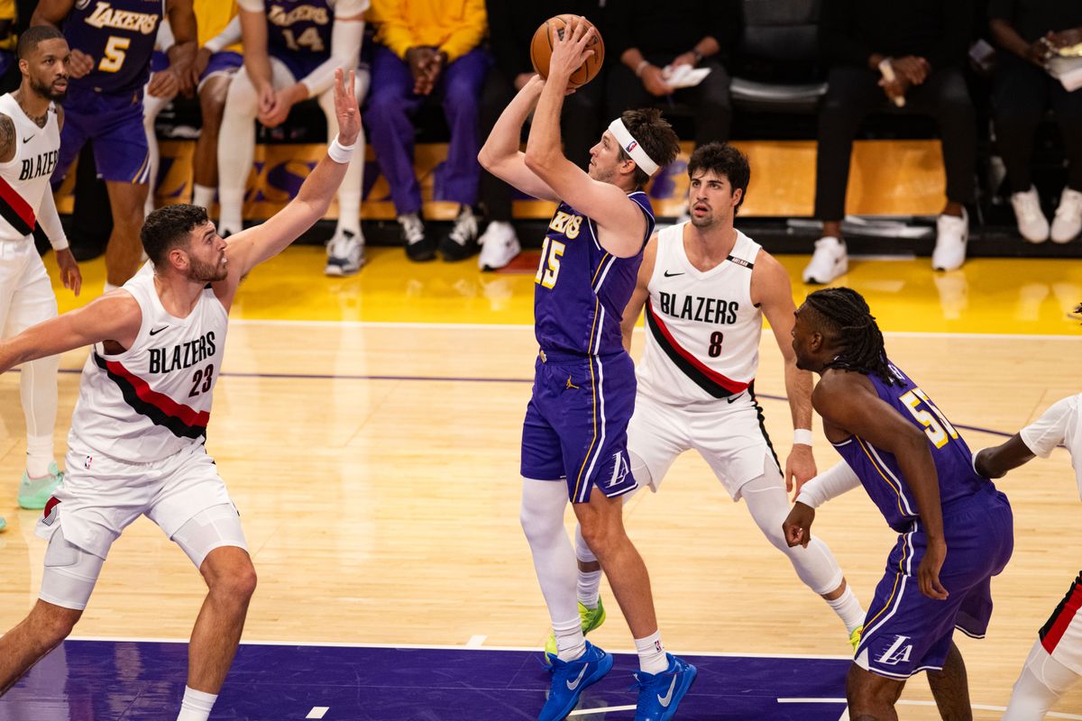 Los Angeles Lakers guard Austin Reaves (15) makes a jump shot during an NBA basketball game against Portland Trailblazers, Tuesday, October 27, 2026 in Los Angeles.