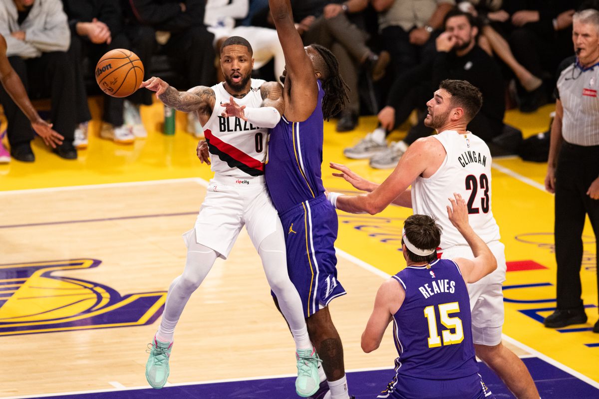 Portland Trailblazers guard Damian Lillard (0) throws out a pass after getting locked out on defense during an NBA basketball game against Los Angeles Lakers, Tuesday, October 27, 2026 in Los Angeles.