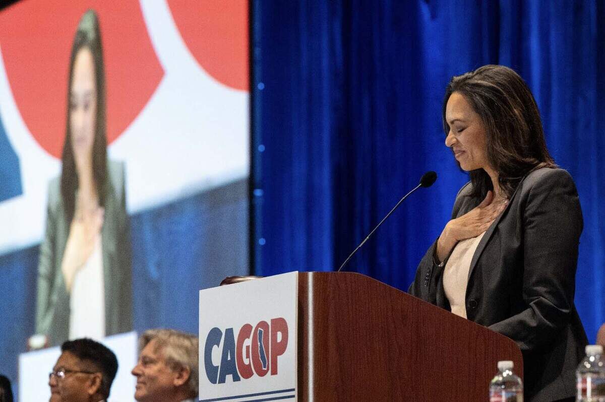 Corrin Rankin puts her hand on her heart as she speaks at the Spring organizing convention in Sacramento after being voted the new California Republican Party chairwoman Sunday, March 16, 2025.