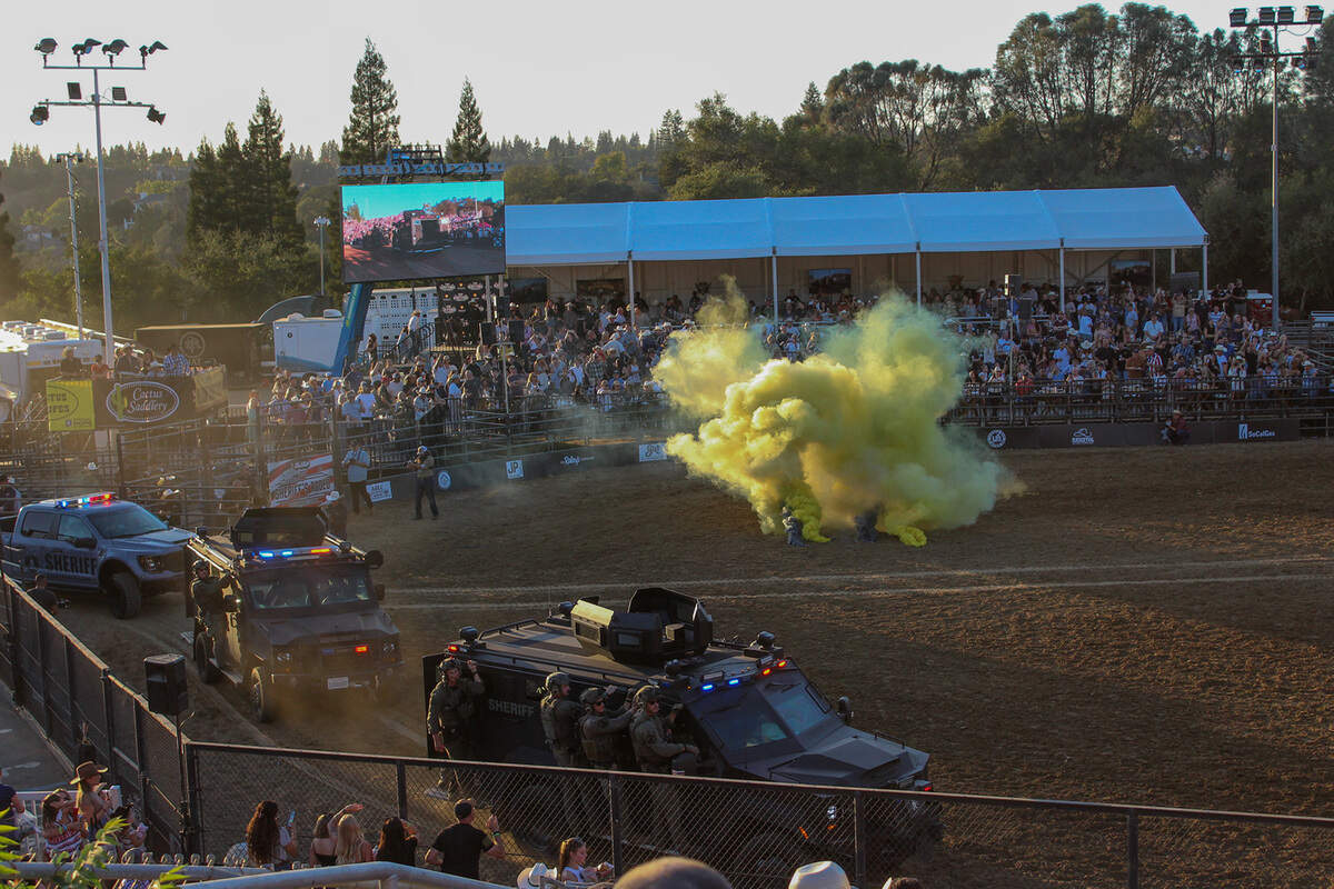 Sheriff’s deputies enter the Dan Russell Rodeo Arena in armored vehicles Oct. 3, 2026 at the Sacramento County Sheriff’s Rodeo