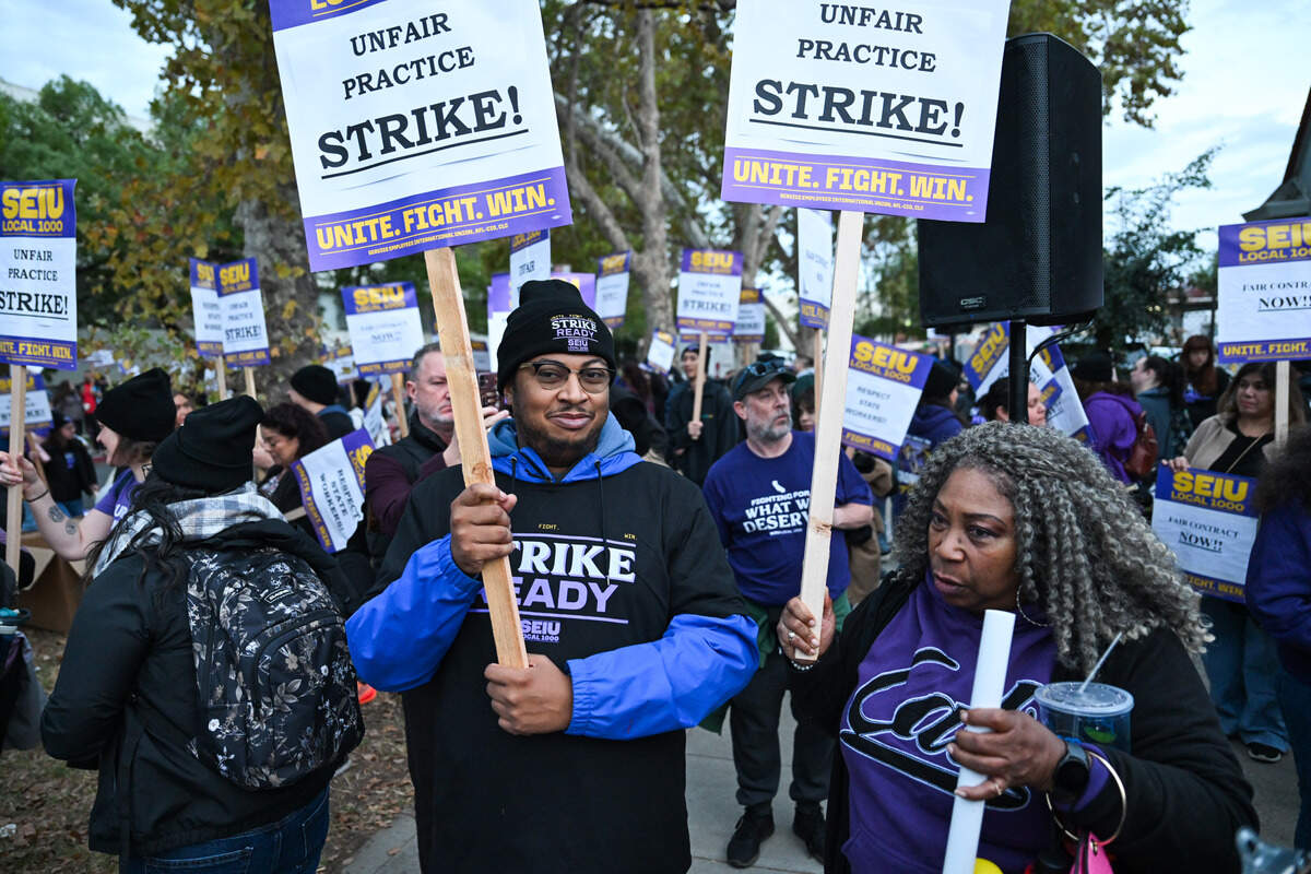 Members of SEIU Local 1000 strike at the California DMV headquarters in Sacramento on Wednesday, Oct. 21, 2026.