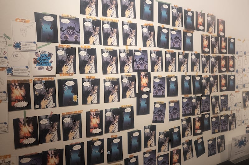 Fans decorate the interactive wall of Solo Leveling, writing their own dialogue into the available panels.