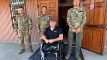 (from left to right) Oleh Bonchynskyi, Denys Haida, Mykola Melnyk, and Volodymyr Balbekin (in wheelchair) all served in the Ukrainian Army and were wounded by Russian weapons, Spring Valley, Calif., October 4, 2026.