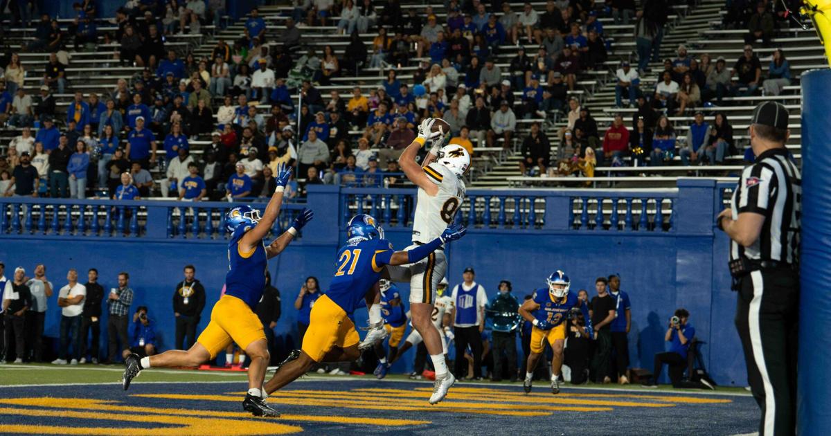 Cowboys rally behind Hughes to snap 8-game road losing streak | Football
