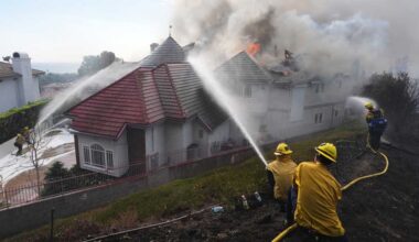 Coastal homes burn as hot winds fuel California fires