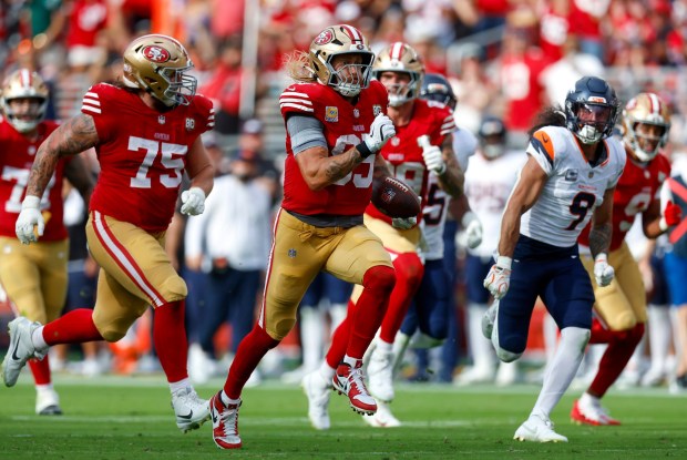 San Francisco 49ers' George Kittle (85) heads to the end zone to score a touchdown on a 56-yard pass against the Denver Broncos in the fourth quarter at Levi's Stadium in Santa Clara, Calif., on Sunday, Oct. 4, 2026. (Nhat V. Meyer/Bay Area News Group)