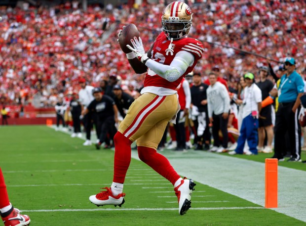 San Francisco 49ers' Deebo Samuel Sr. (19) comes down with a 1-yard touchdown catch against the Denver Broncos in the third quarter at Levi's Stadium in Santa Clara, Calif., on Sunday, Oct. 4, 2026. (Nhat V. Meyer/Bay Area News Group)