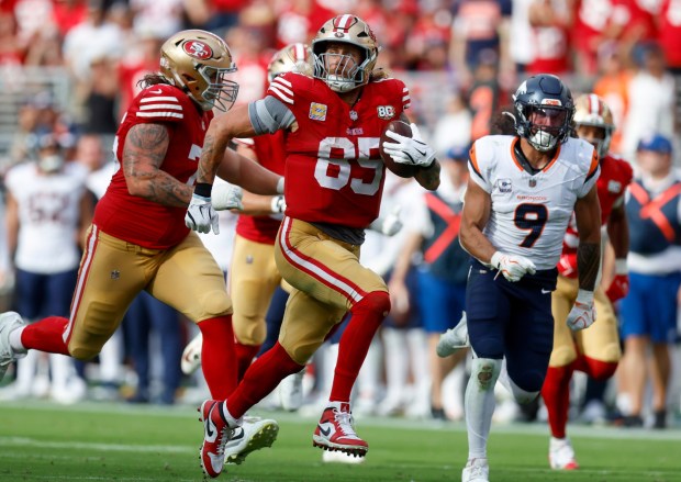 San Francisco 49ers' George Kittle (85) heads to the end zone to score a touchdown on a 56-yard pass against the Denver Broncos in the fourth quarter at Levi's Stadium in Santa Clara, Calif., on Sunday, Oct. 4, 2026. (Nhat V. Meyer/Bay Area News Group)
