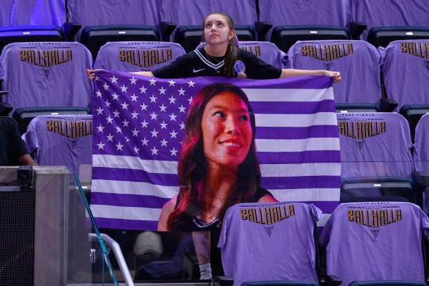 A Golden State Valkyries fan holds a flag of Golden State Valkyries' Kaitlyn Chen (2) while waiting for the start of Game 1 of the WNBA Finals at Chase Center in San Francisco, Calif., on Saturday, Oct. 17, 2026. (Jose Carlos Fajardo/Bay Area News Group)