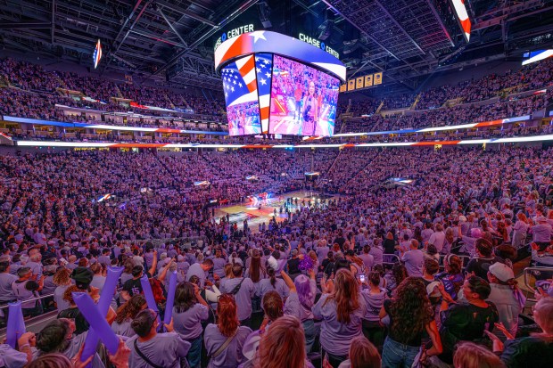 WNBA fans listen to the playing of the national anthem before the start of Game 1 of the WNBA Finals at Chase Center in San Francisco, Calif., on Saturday, Oct. 17, 2026. (Jose Carlos Fajardo/Bay Area News Group)