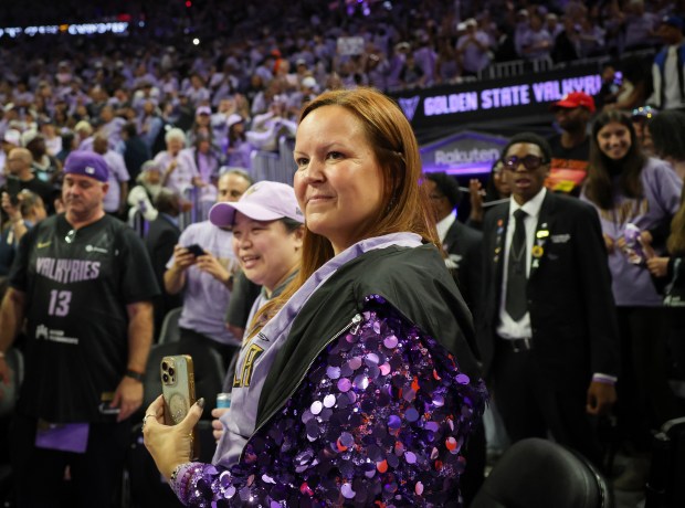 Melanie Perron smiles after the Golden State Valkyries walk back into the locker rooms after their game against the Atlanta Dream for game 1 of the WNBA Finals at the Chase Center in San Francisco, Calif., on Saturday, Oct. 17, 2026. (Shae Hammond/Bay Area News Group)