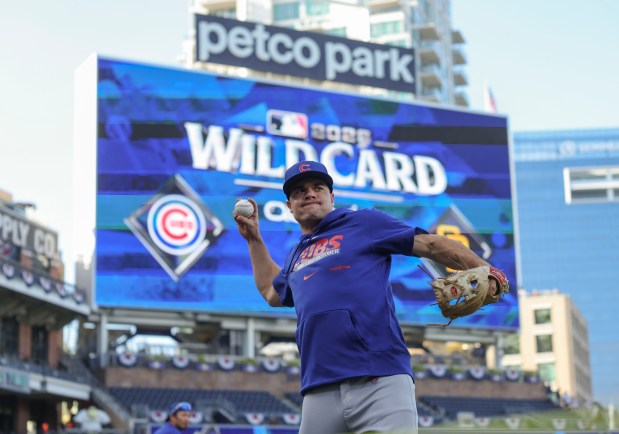 Cubs third baseman Matt Shaw warms up to face the Padres in Game 2 of their wild-card series on Sept. 30, 2026, in San Diego. (Brian Cassella/Chicago Tribune)