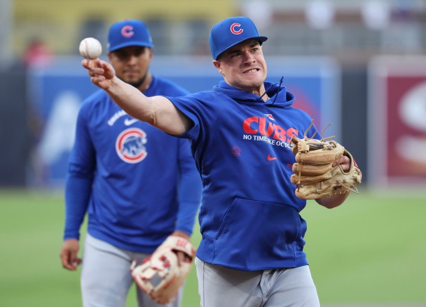 Cubs third baseman Matt Shaw warms up in front of Pedro Ramírez to face the Padres in Game 2 of their wild-card series on Sept. 30, 2026, in San Diego. (Brian Cassella/Chicago Tribune)