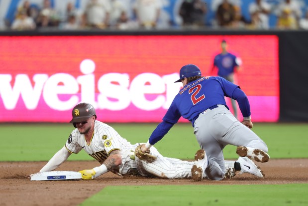 Padres center fielder Jackson Merrill slides safely into second base past Cubs second baseman Nico Hoerner during the second inning in Game 2 of their wild-card series on Sept. 30 2026, in San Diego. (Brian Cassella/Chicago Tribune)
