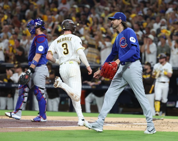 Chicago Cubs pitcher Kevin Gausman watches San Diego Padres center fielder Jackson Merrill score in the second inning during Game 2 of their wild-card series on Sept. 30 2026, in San Diego. (Brian Cassella/Chicago Tribune)