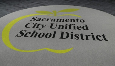 A rug with the Sacramento City Unified logo