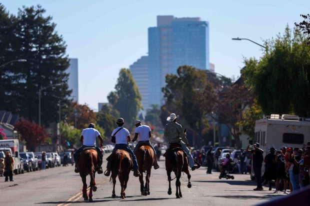Cowboys participate in the Oakland Black Cowboy Association's 52nd Annual Parade and Festival at DeFremery Park in Oakland, Calif., on Saturday, Oct. 3, 2026. The event brought the community together under the theme "Preserving Our Heritage, Inspiring Our Future," featuring live entertainment, line dancing, youth activities, pony rides, food, local vendors and community resources. (Ray Chavez/Bay Area News Group)