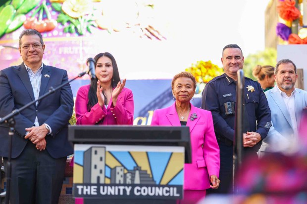 Consul General of Mexico in San Francisco Marco Antonio Mena Rodriguez, left, The Unity Council Director of Fund Development and Communications Caheri Gutierrez, Oakland Mayor Barbara Lee, Oakland Police Chief James Beere and Visit Oakland President Peter Gamez watch a dance performance by Ballet Folklórico de Fremont High School during the official welcome ceremony for La Catrina, a monumental 34-foot sculpture handcrafted in Mexico City and installed in the heart of the Fruitvale district in Oakland, Calif., on Thursday, Oct. 1, 2026. According to The Unity Council, the traditional Mexican art piece is the tallest Catrina sculpture in the United States, honoring culture, pride, remembrance, resilience, and generations of immigrants who empower and enrich the city. The ceremony featured speakers, a blessing ceremony along with dance performances and live mariachi music. The sculpture will be on display through the annual Día de los Muertos festival. (Ray Chavez/Bay Area News Group)