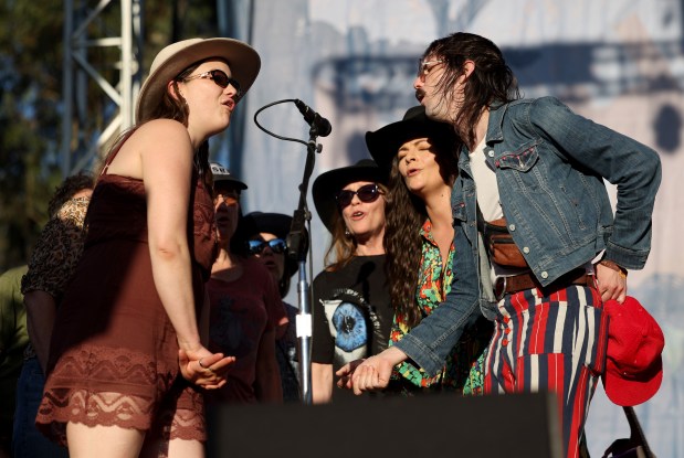 Members of the Hellman family sing before Steve Earle and The Hardly Strictly Dukes perform on the Banjo Stage at the Hardly Strictly Bluegrass Festival in Golden Gate Park in San Francisco, Calif., on Saturday, Oct. 3, 2026. Warren Hellman founded the free annual HSB festival in 2001. (Jane Tyska/Bay Area News Group)