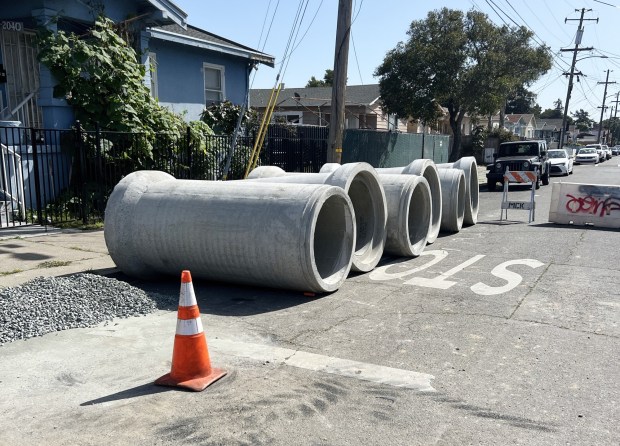 City of Oakland public works crews repair a 55th Avenue storm drain between Bancroft Avenue and Harmon Avenue in 2023.