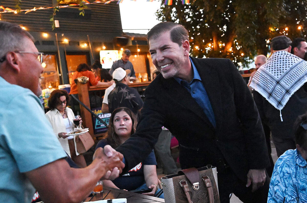 Fresno City Council District 3 candidate Joaquin Arambula is seen greeting supporters at a campaign gathering Tuesday night, June 2, 2026 in Fresno.