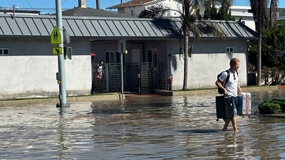 Newport Beach shuts all beaches and piers. (AP Photo/Eugene Garcia)